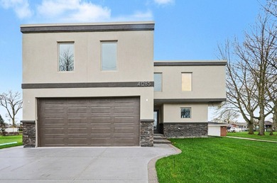 This beautifully renovated contemporary custom waterfront home - photo 3