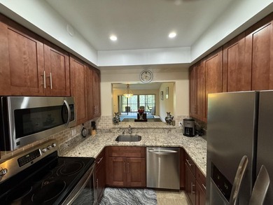 Welcome to this 3-bedroom, 2-bathroom water & Golf front - photo 3