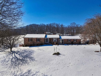 Beautifully remodeled four-bedroom, two-bath brick ranch