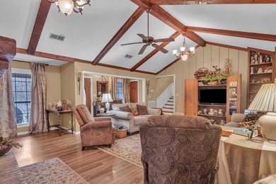 Nestled on a hill, this charming 4-bedroom, 2.5-bath home is - photo 2