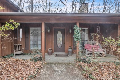 Nestled on a hill, this charming 4-bedroom, 2.5-bath home is - photo 5