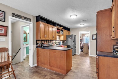 Nestled on a hill, this charming 4-bedroom, 2.5-bath home is - photo 9