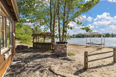 Tucked into 10+ wooded acres in Twin Lake, this rare property - photo 3