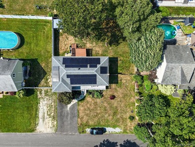This charming classic 3-bedroom, 2-bath ranch offers comfort - photo 3