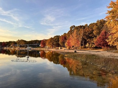 Tucked into 10+ wooded acres in Twin Lake, this rare property - photo 8