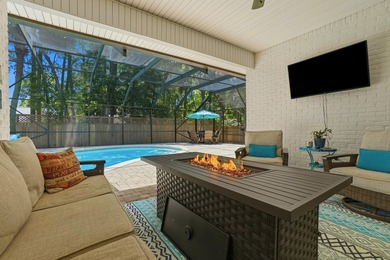 Movie theater? Covered heated pool? This stunning 5 bed, 4 bath - photo 43