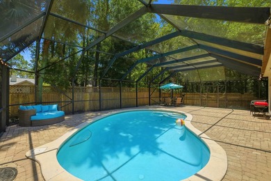 Movie theater? Covered heated pool? This stunning 5 bed, 4 bath - photo 47