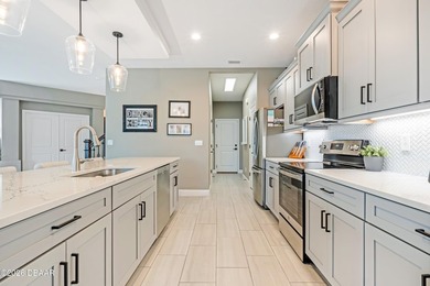 Discover a spacious contemporary home perfectly zoned for the - photo 9