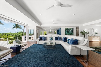 Experience the ultimate in beachfront living at 4577 Waters Edge - photo 1