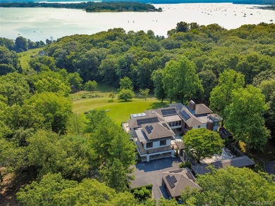 Perched above Oyster Bay Harbor on 4.04 private acres in the - photo 1