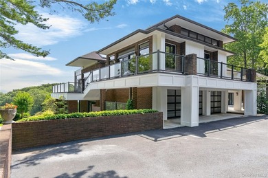 Perched above Oyster Bay Harbor on 4.04 private acres in the - photo 4