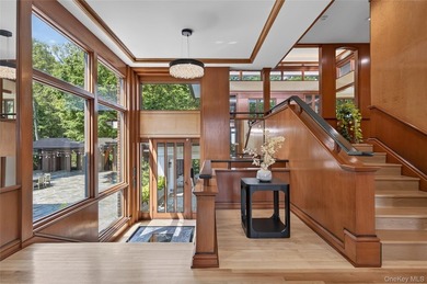 Perched above Oyster Bay Harbor on 4.04 private acres in the - photo 6