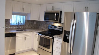 Completely remodeled first floor unit ready to move in. Spacious - photo 8