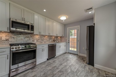 Newly Renovated - All You Need to Do is Unpack. New Tile Floors - photo 7