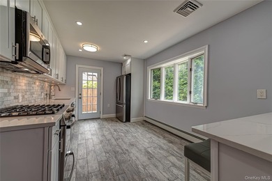 Newly Renovated - All You Need to Do is Unpack. New Tile Floors - photo 9
