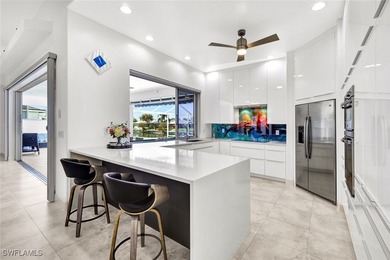 Unique custom waterfront home on a a 100 feet wide canal and - photo 9