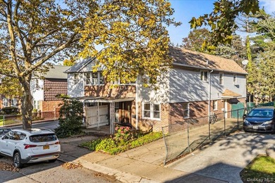 Welcome to Charming Two-Family Home in Prime Oakland Gardens, a - photo 1