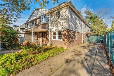 Welcome to Charming Two-Family Home in Prime Oakland Gardens, a - photo 2