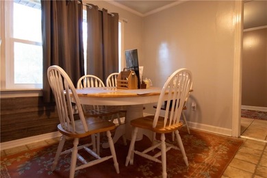 PRICE REDUCED! Welcome to this inviting 3-bedroom, 2-bath brick