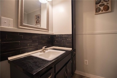 PRICE REDUCED! Welcome to this inviting 3-bedroom, 2-bath brick