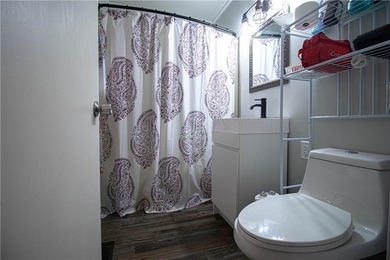 PRICE REDUCED! Welcome to this inviting 3-bedroom, 2-bath brick