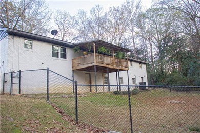 PRICE REDUCED! Welcome to this inviting 3-bedroom, 2-bath brick