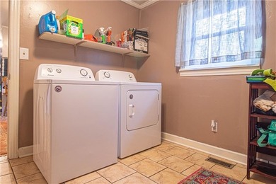 PRICE REDUCED! Welcome to this inviting 3-bedroom, 2-bath brick