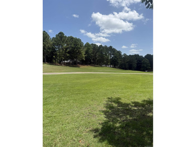 Located on the pristine 7th green of Granada Golf Course, you'll - photo 2