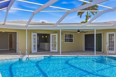 Beautiful waterfront home with spacious newly resurfaced pool - photo 34