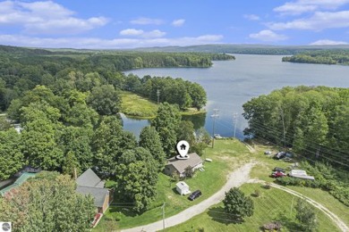 Hodenpyl Dam Lake Home For Sale in Mesick Michigan