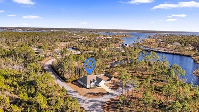 Tucked away in the gated waterfront community of Laird Point - photo 3