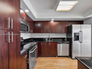 Spacious 1-Bedroom, 1.5-Bath Condo in the Heart of Aventura - photo 3