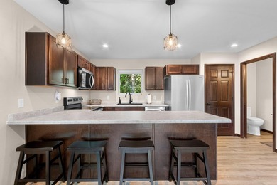 Experience the best of both worlds in this 2025-built home on - photo 7