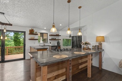 This Ridgefield Home Enjoys Evening Sunsets, with Views Of Lake - photo 9