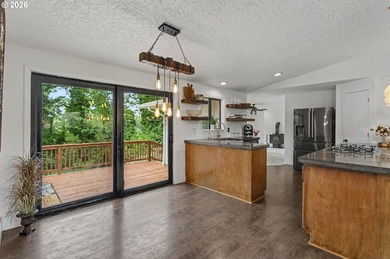 This Ridgefield Home Enjoys Evening Sunsets, with Views Of Lake - photo 10