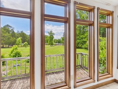 Unlock the potential of this charming lakefront fixer-upper on - photo 12