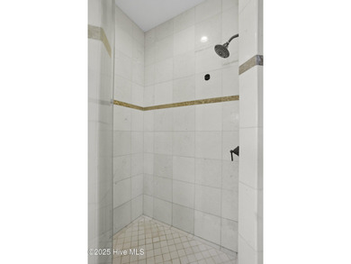 Welcome to 4 Sandy Point, a rare opportunity to own a