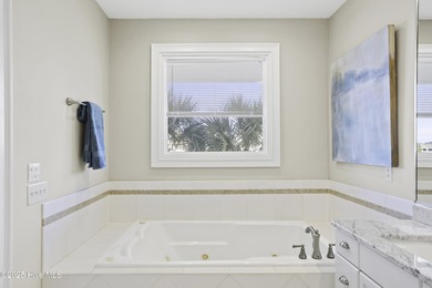 Welcome to 4 Sandy Point, a rare opportunity to own a