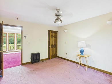 Unlock the potential of this charming lakefront fixer-upper on - photo 26