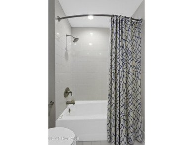 Welcome to 4 Sandy Point, a rare opportunity to own a