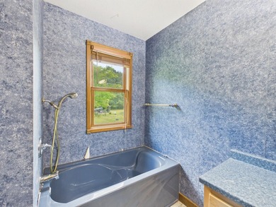 Unlock the potential of this charming lakefront fixer-upper on - photo 36