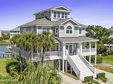 Welcome to 4 Sandy Point, a rare opportunity to own a