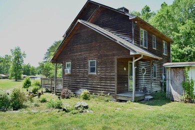 Unlock the potential of this charming lakefront fixer-upper on - photo 47