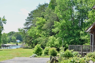 Unlock the potential of this charming lakefront fixer-upper on - photo 48