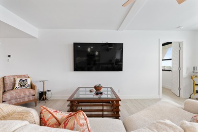 Experience elevated coastal living in this immaculate, fully - photo 11
