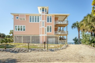Panoramic sunset views and unmatched waterfront living in this - photo 3