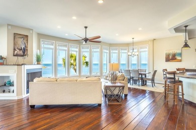 Panoramic sunset views and unmatched waterfront living in this - photo 6