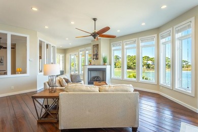 Panoramic sunset views and unmatched waterfront living in this - photo 7