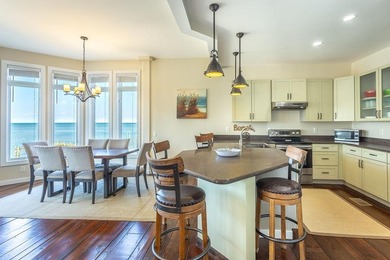 Panoramic sunset views and unmatched waterfront living in this - photo 8
