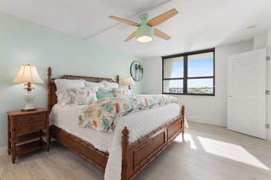 Experience elevated coastal living in this immaculate, fully - photo 27